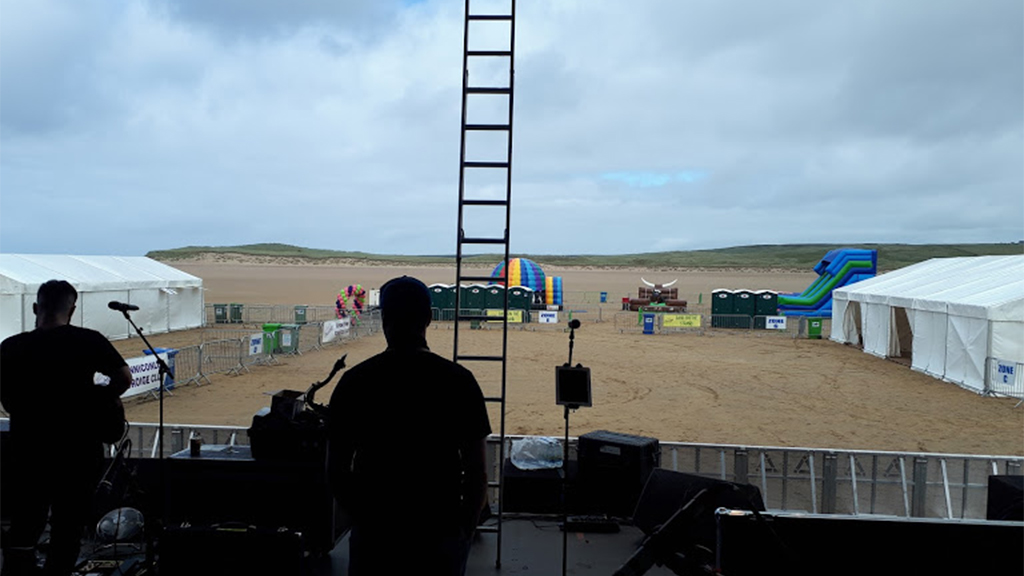 Looking out from a stage at a music festival site build
